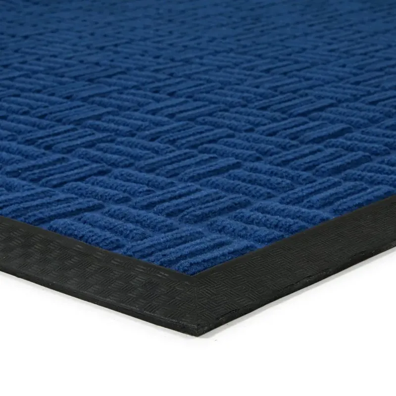Modrá textilní gumová vstupní rohož FLOMA Criss Cross - délka 90 cm, šířka 150 cm, výška 0,8 cm Favoriet